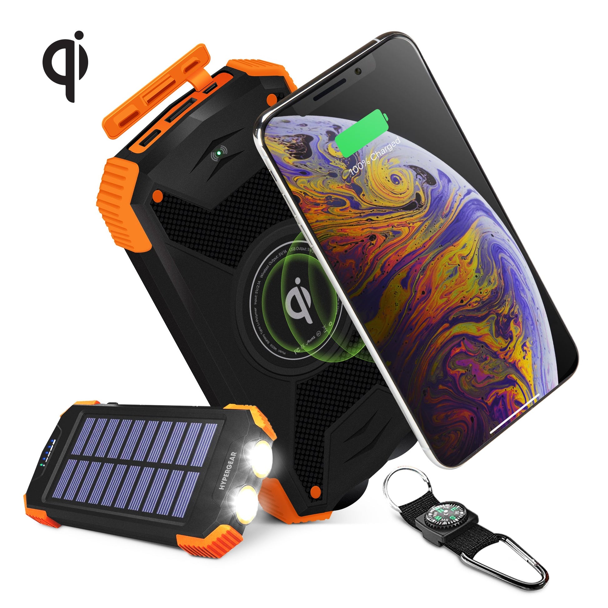 Black HyperGear 10000mAh power bank with its solar panel facing up, next to a charging phone.